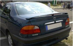 Rear spoilers on the lid of a sedan.