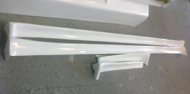 Sideskirts set and rear bumper add